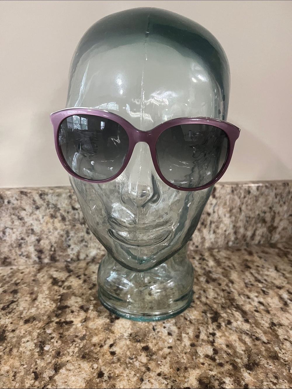 Women’s purple Michael Kors Windsor sunglasses.